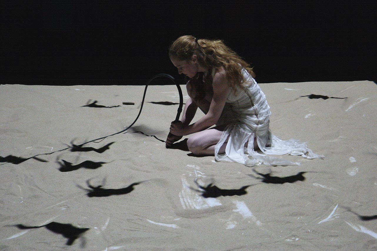 6 Feet Deeper -  Floor projection on a stage filled with sand.