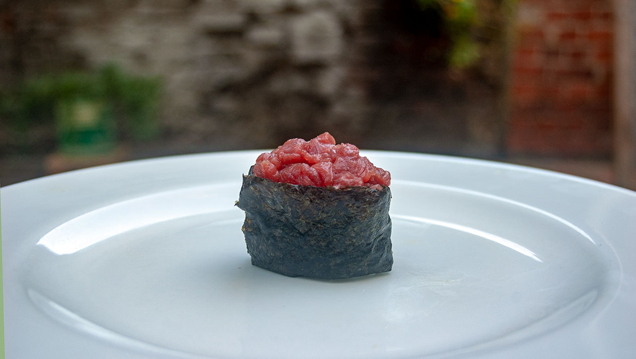 Beef Tar Tar Gunkan Maki with beef tartar with caper, anchovy, chive, mustard