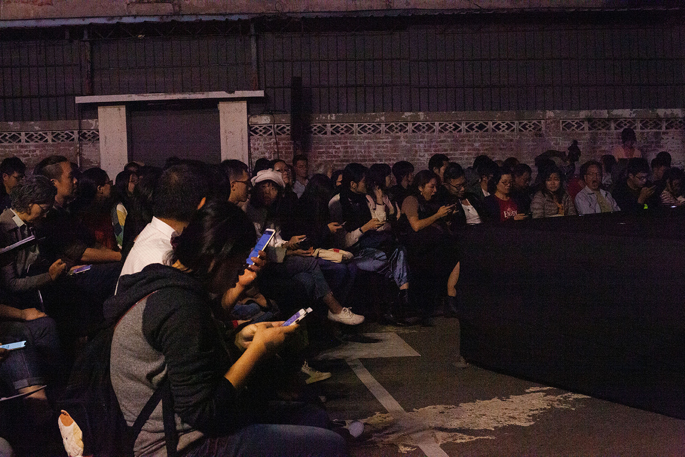 Audience members participate via their smart phones.